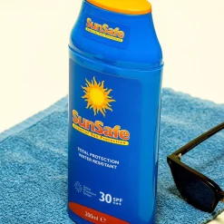 Zonnebrandcrèmefles voor spullen